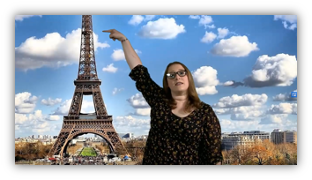 Person standing next to Eiffel tower as an example of a green screen video